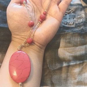 stone necklace with gold accents